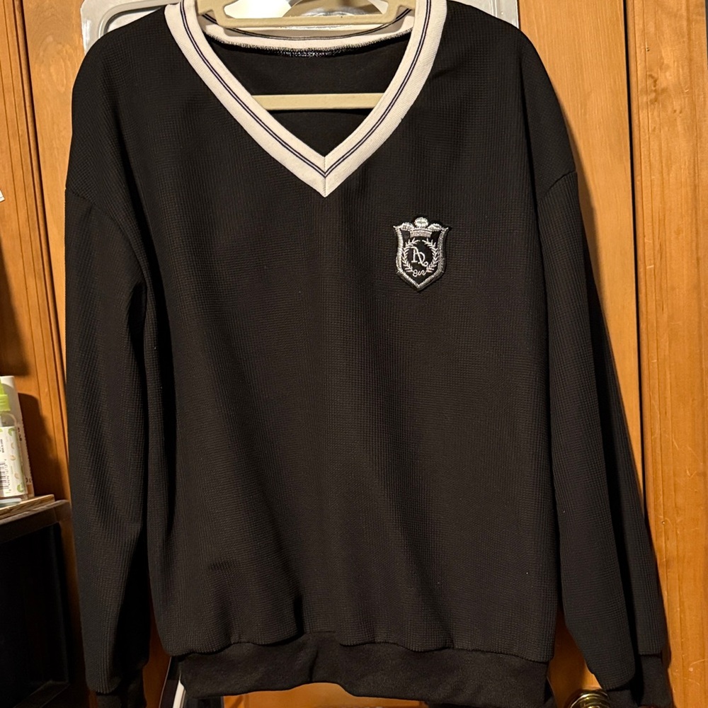 Black V-Neck Collegiate Sweater with Embroidered Crest